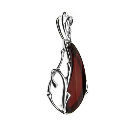 Silver pendant with amber