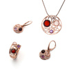 Silver pendant with amber and quartz