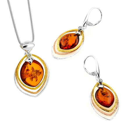 Silver pendant with amber
