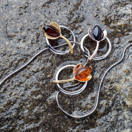 Silver pendant with amber