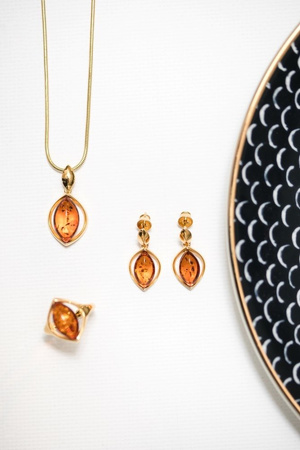 Silver pendant with amber