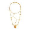 Silver necklace with amber