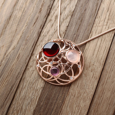 Silver pendant with amber and quartz
