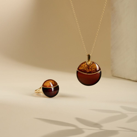 Silver pendant with amber