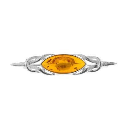 Silver brooch with amber