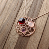 Silver pendant with amber and quartz